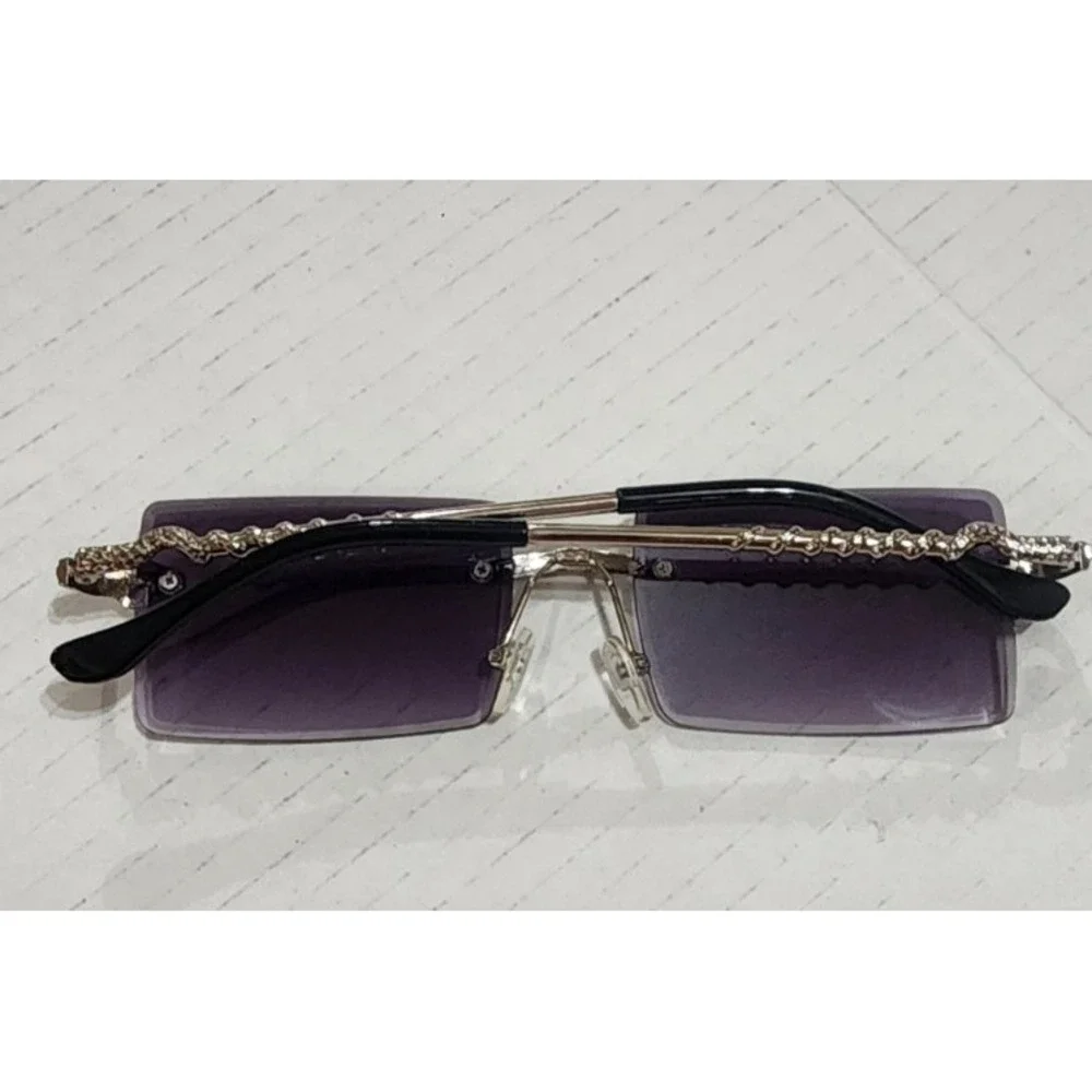Womens silver snake embellished rimless fashionable sunglasses uv protection